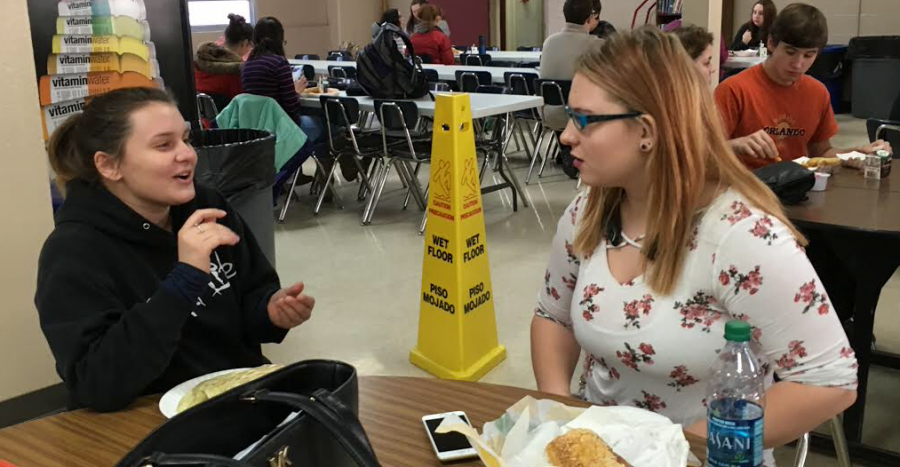 Trinity Anthony 19 (right) sits at lunch with Jess Vaillincourt 19.