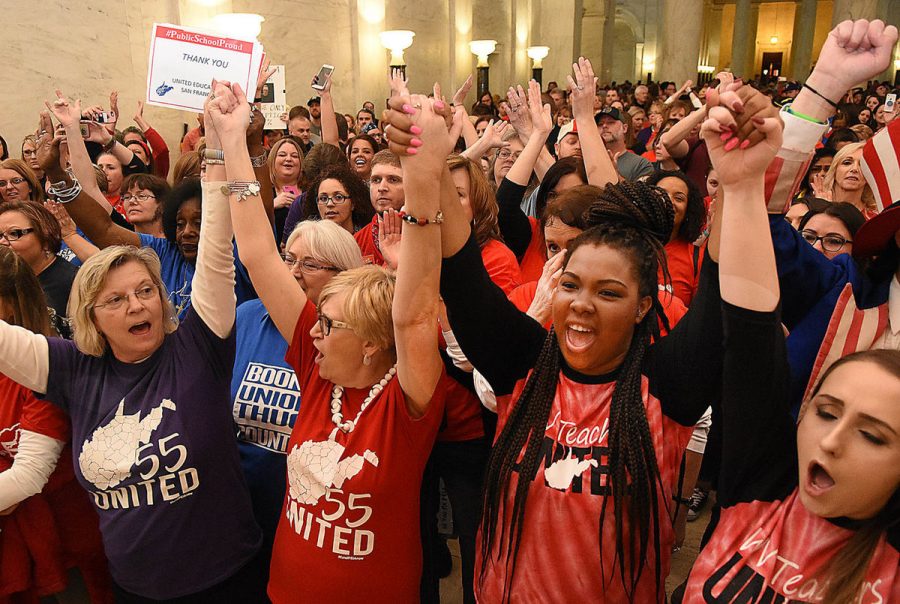 The teachers celebrating the raise. Photo from Cumberland Times News.