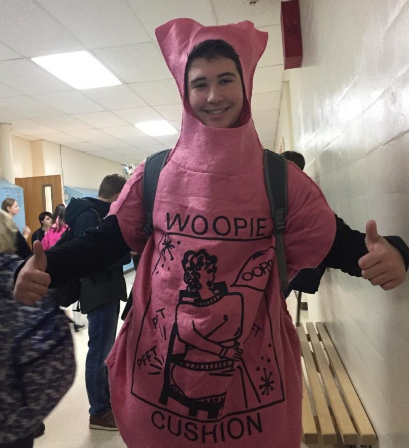Ben Duprey ‘22 poses as a life size whoopee cushion on the October 31 Halloween dress-up day. “When he walked in the school I didnt know what he was at first,” said Courtney Kane ‘22.
