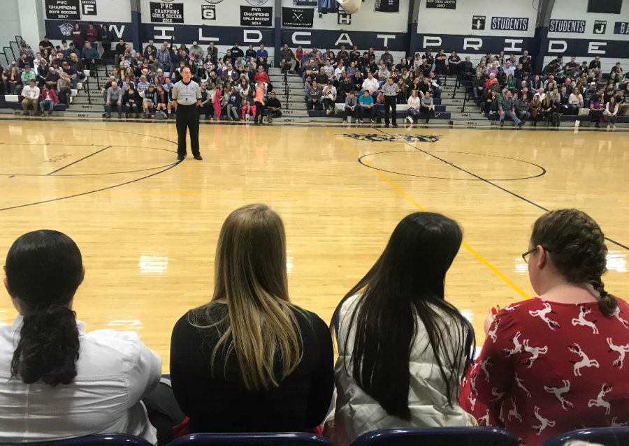 Did you mark that down on your stat sheet? Two Seniors sidelined Savannah Rodriguez and Sydney Thompson. Sitting beside them Managers Riley Davis, and Carly Guerrette pay close attention to the game as they keep stats at the Varsity Girls basketball game On December 22.