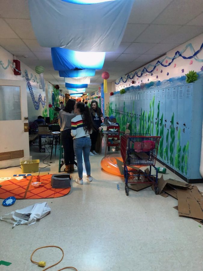 PIHS students get ready to compete in Deck the Halls. They worked after school for a few days in preparation for the event. ”I loved participating in Deck the Halls because I love seeing the work come together and I get to socialize with people I normally don’t talk to,” said Courtney Kane 22.
