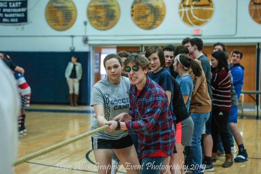 The Class of 2022 battles to win against the Class of 2019 during Tug of War.  The freshmen finished 4th overall.