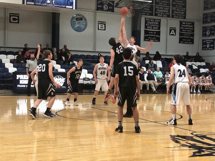 A JV boys basketball game between Presque Isle and Houlton tips off on December 11th of 2019. This season, given the undoing pandemic, the MPA has decided to eliminate the tip off in favor of a coin toss to decide possession. “It’s going to be so different doing a coin toss,” said senior Hattie Bubar. “I feel like it’s not the same without a tip off.