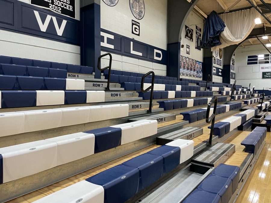 Bleachers+in+the+lower+gym+at+Presque+Isle+High+School+stand+empty%2C+devoid+of+parents+and+students+alike+due+to+the+indoor+gathering+restrictions+put+in+place+by+the+Maine+CDC.