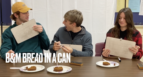 Jack Hallett 23, Ethan Shaw 22 and Lita Perkins 25 get ready to score bread in a can during the taste test.