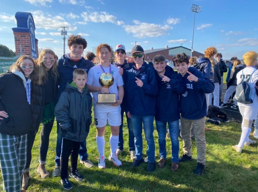 Presque Isle High School Athletes enjoy taking pictures with Class C state champions, Waynflete. Waynflete had an game exciting victory over Fort Kent on Saturday. “It’s amazing the intensity players have when they are playing for a goal ball,” said Hunter Reed ‘24.