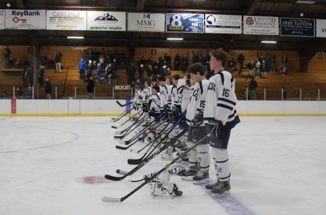 Presque Isle Wildcats varsity hockey teams lines up to take on the Blackhawks. On December 14, 2021 the Wildcats had their home opener where they hosted the Blackhawks. They Wildcats ended up taking the win 5-1.