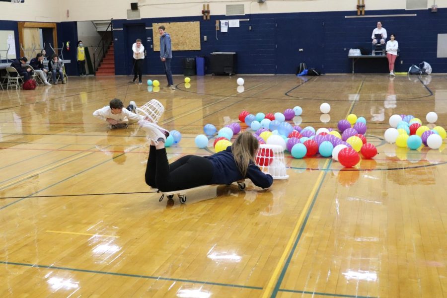 Audrey Miller ‘24 getting the balloons in Hungry Hungry Hippos to gain points for her team.