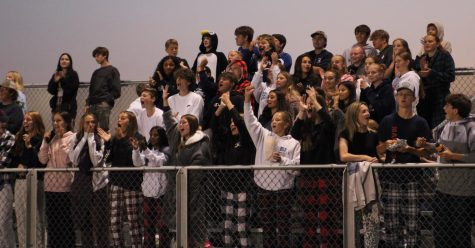 Wildcats fans cheer on varsity boys in their pajamas on September 6.