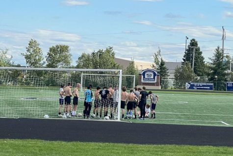 Boys varsity soccer huddles up before practice on Thursday, September 1