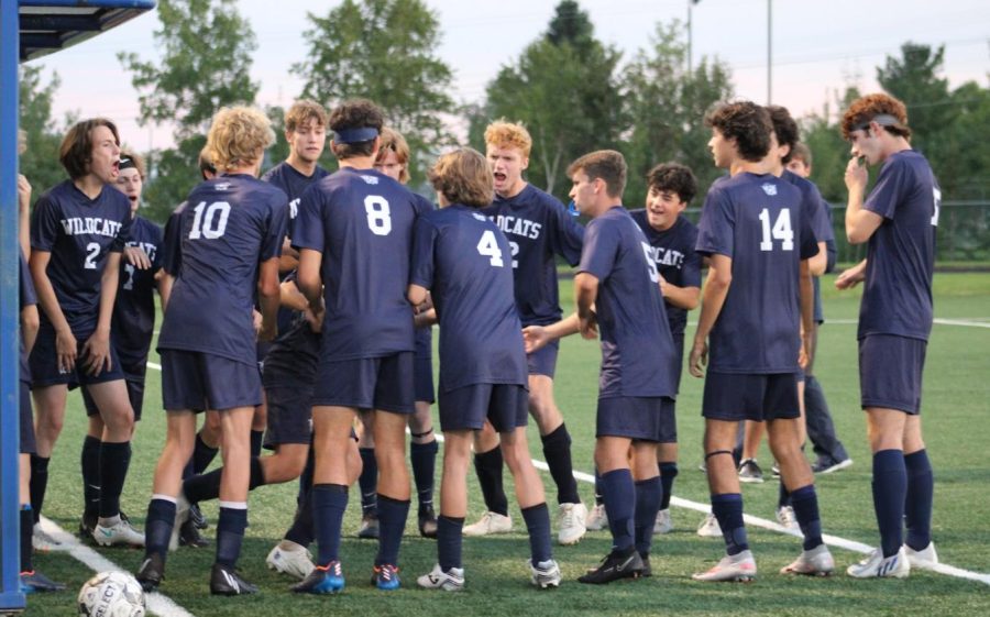The team gets fired up before their game against the Warriors.
