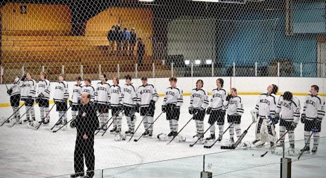 The PIHS hockey team stands respectfully for the national anthem. This is Senior Breygan Mahan’s last season. “We will have to play together and have chemistry in the lockeroom and on the ice