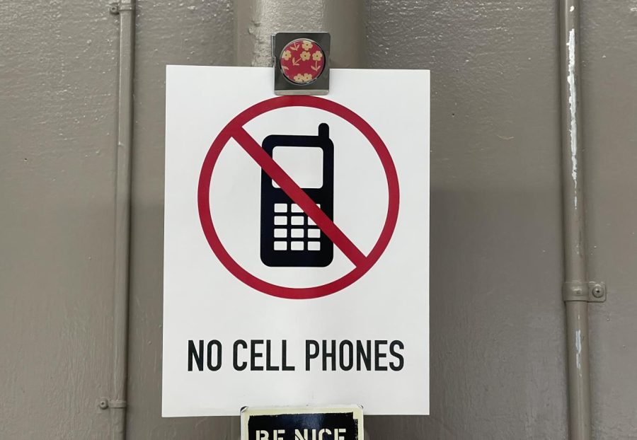 “No Cell Phone Zone” sign in Mrs. Young’s English room. 