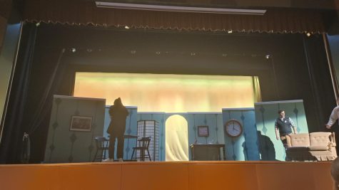 Stage manager Alexandra McPherson 24 and Mr. Daniels hustle in Brewer during tech time on Saturday, March 11.