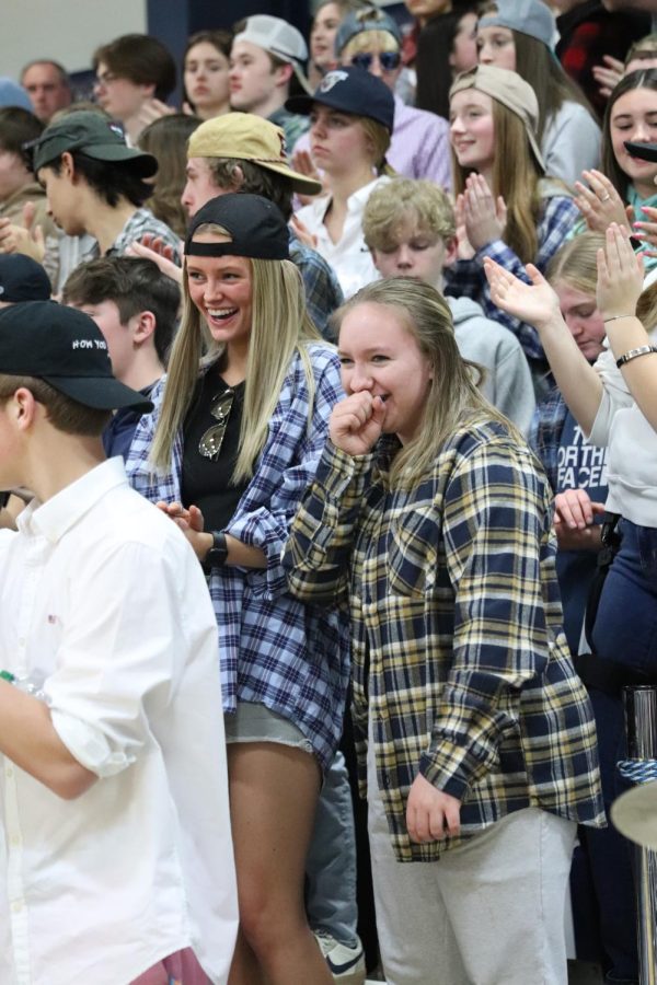 Alyssa Blade ’26 and Summer Sponberg during Frat night in the PIHS student section.