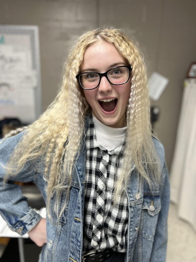 Erin Kelly ’23 poses for the decades dress up day during winter carnival.