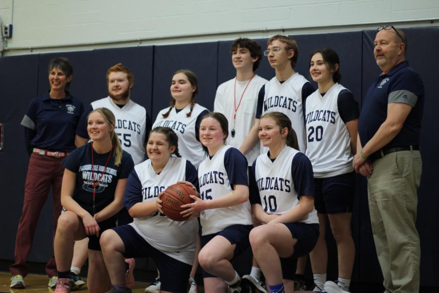 The Presque Isle Unified Basketball team poses for a team photo during the game on February 28.