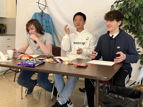 Anchor staff members Ethan Dionne and Xavier Peng join Camden ODonnell 26 take time to taste snacks and give them a score.