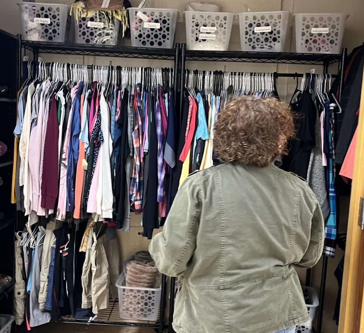 Kayla Libby 26 checks out the new Wildcat thrift shop on the way to the art room.