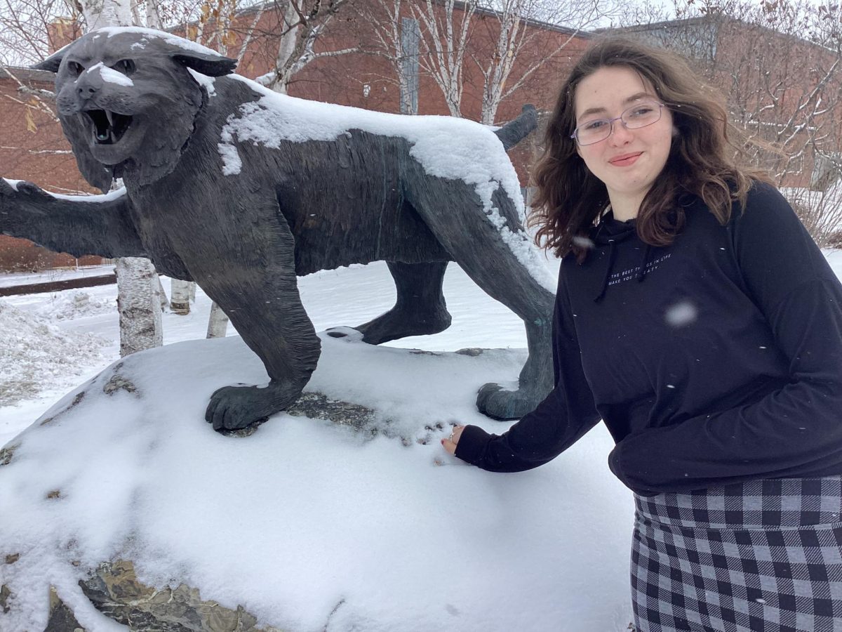 Fiona Smith ‘27 hanging with the Wildcat in the snow.