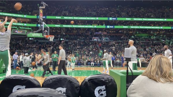 Celtics players warming up for their upcoming game. 