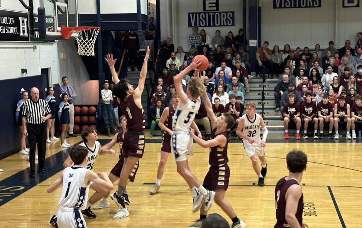 Fighting Inside. Brent Greenlaw ’25 takes it to the rack and gets fouled. The Wildcats lost with a score of 58-25. “What drives me is going to war with my teammates and fighting side by side,” Greenlaw said.
