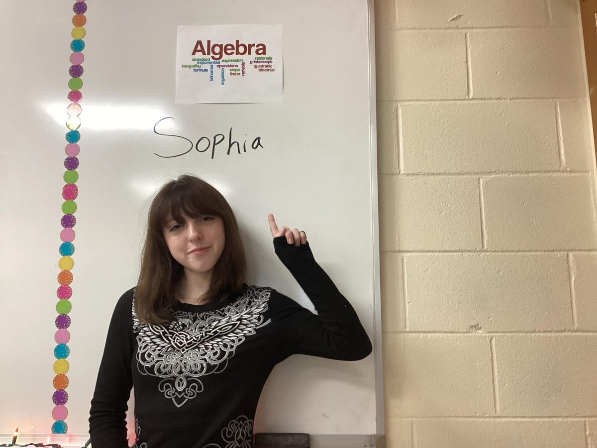 Sophia Archer ‘27 posing in her favorite period’s classroom—Mrs. Gardner’s Algebra room.