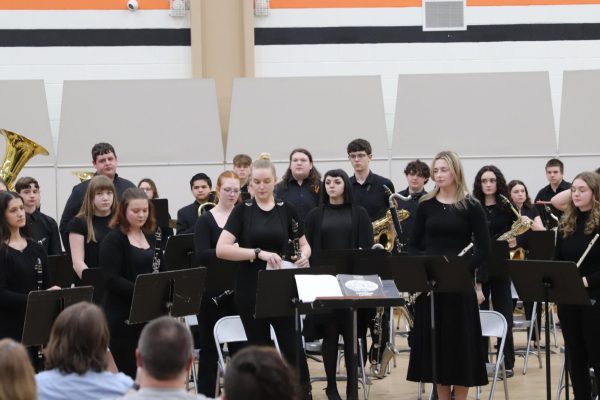The All-Aroostook band students stand to take a bow after their performance on January 15 at Ashland District School.